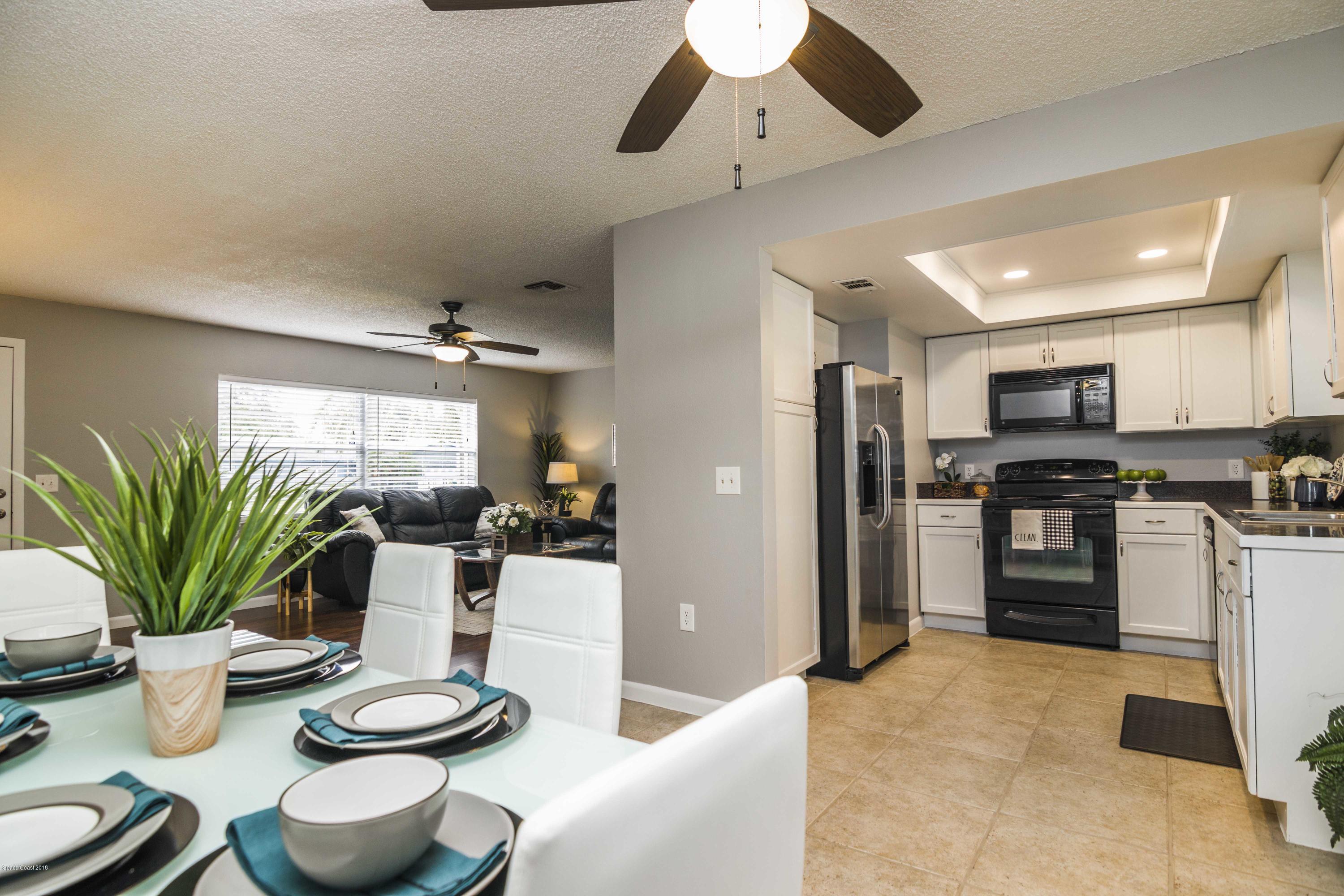 2227 Spring Circle Cocoa, FL 32926 - Photo 6 of 25 Dining to Kitchen
