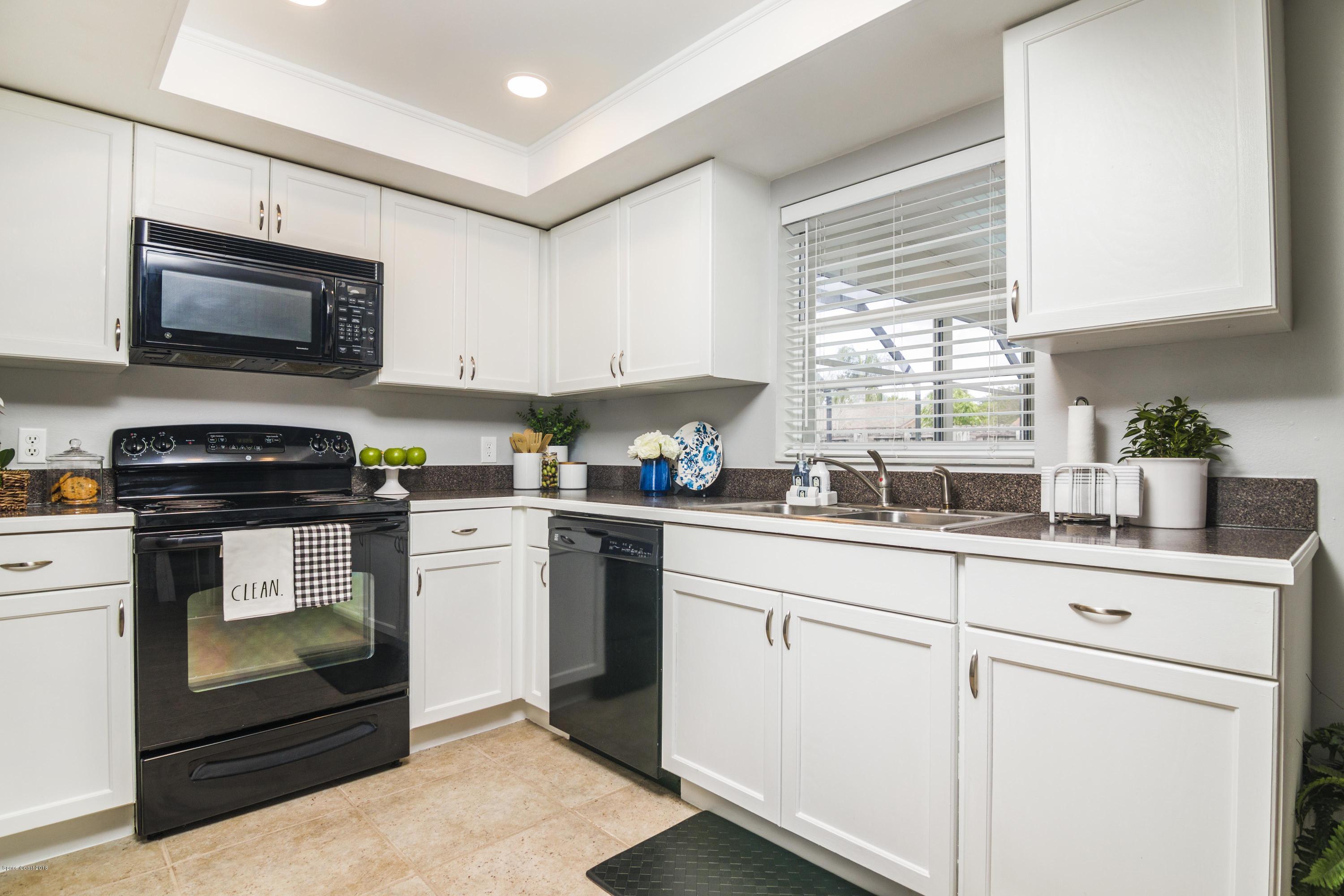 2227 Spring Circle Cocoa, FL 32926 - Photo 8 of 25 Kitchen w/Pass Thru windon