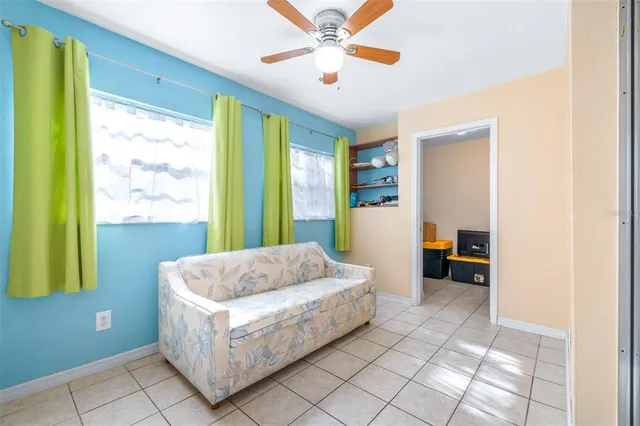 a bathroom with a toilet sink vanity and mirror