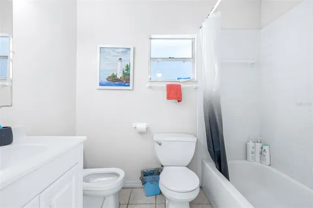 a view of a living room with a large window