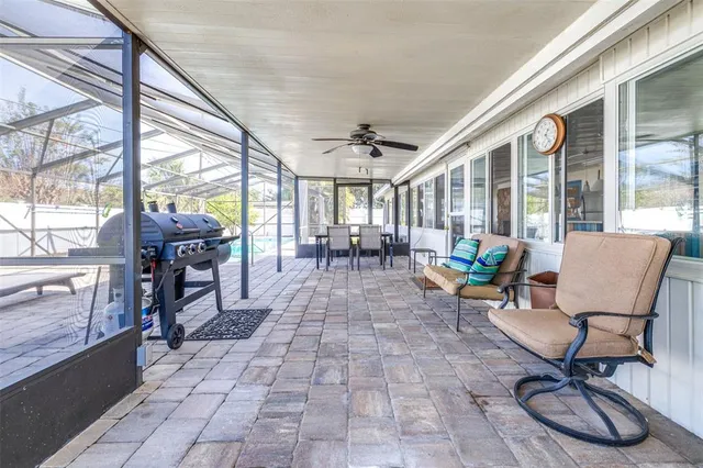 an aerial view of a house with outdoor space