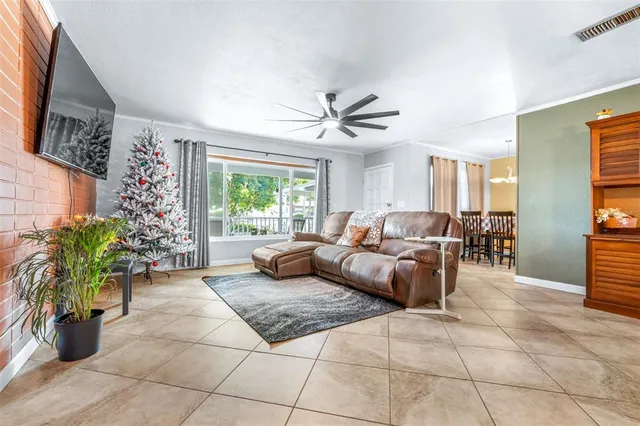 a view of a patio with a table and chairs
