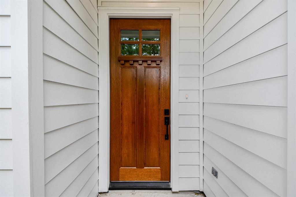 2305 Maury Street Houston, TX 77026 - Photo 19 of 19 Step inside this thoughtfully designed 2022 construction two-story home featuring an open floor plan adorned with top-of-the-line finishes. The first floor boasts a chef's dream kitchen with stunning calacatta quartz countertops, stainless steel appliances, wine fridge, and ample cabinetry, ensuring a delightful cooking and dining experience. Natural light floods the entire living area, creating a warm and inviting ambiance.