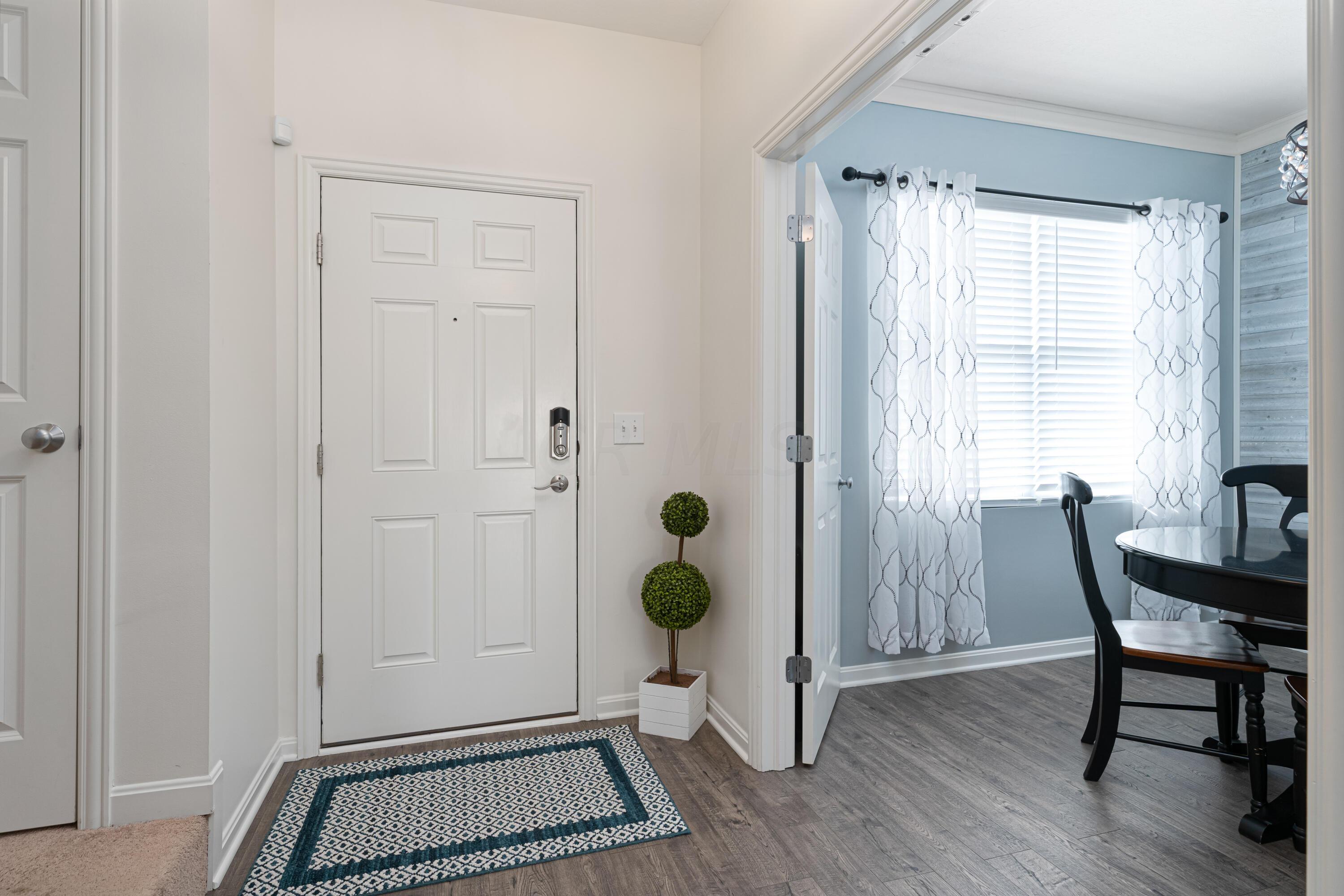 6056 Heckert Road Columbus, OH 43081 - Photo 6 of 42 2-story Entry. French Doors to Office.