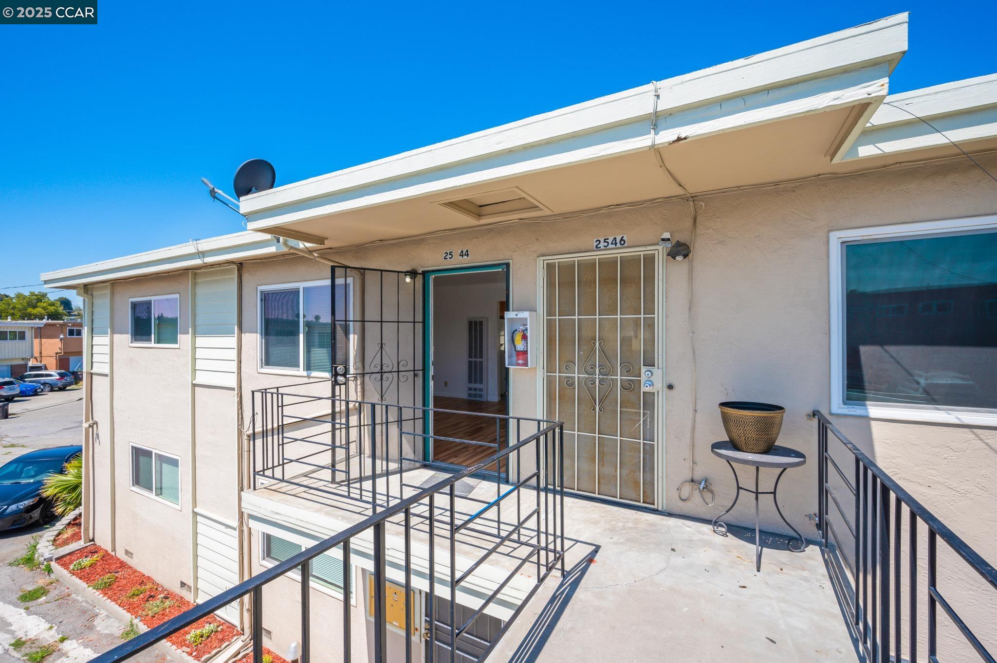 2544 Denning Court Castro Valley, CA 94546 - Photo 3 of 19 a balcony with table and chairs