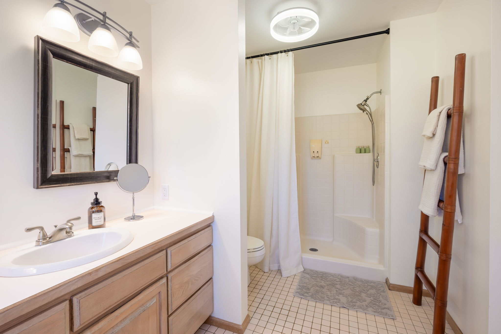 3685 Waha Road Kalaheo, HI 96741 - Photo 11 of 30 a bathroom with a sink a toilet and shower