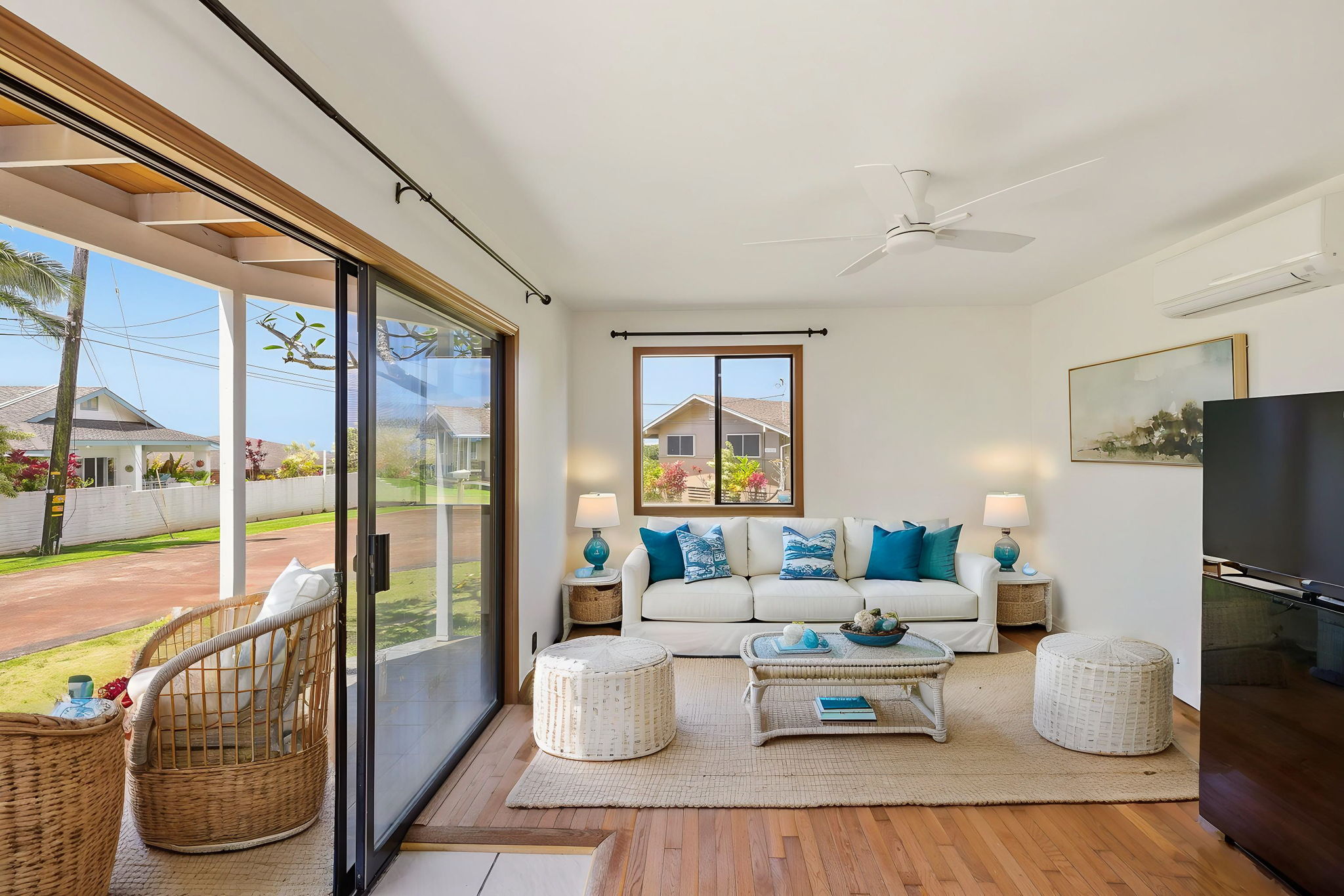 3685 Waha Road Kalaheo, HI 96741 - Photo 19 of 30 a living room with furniture a large window and flat screen tv