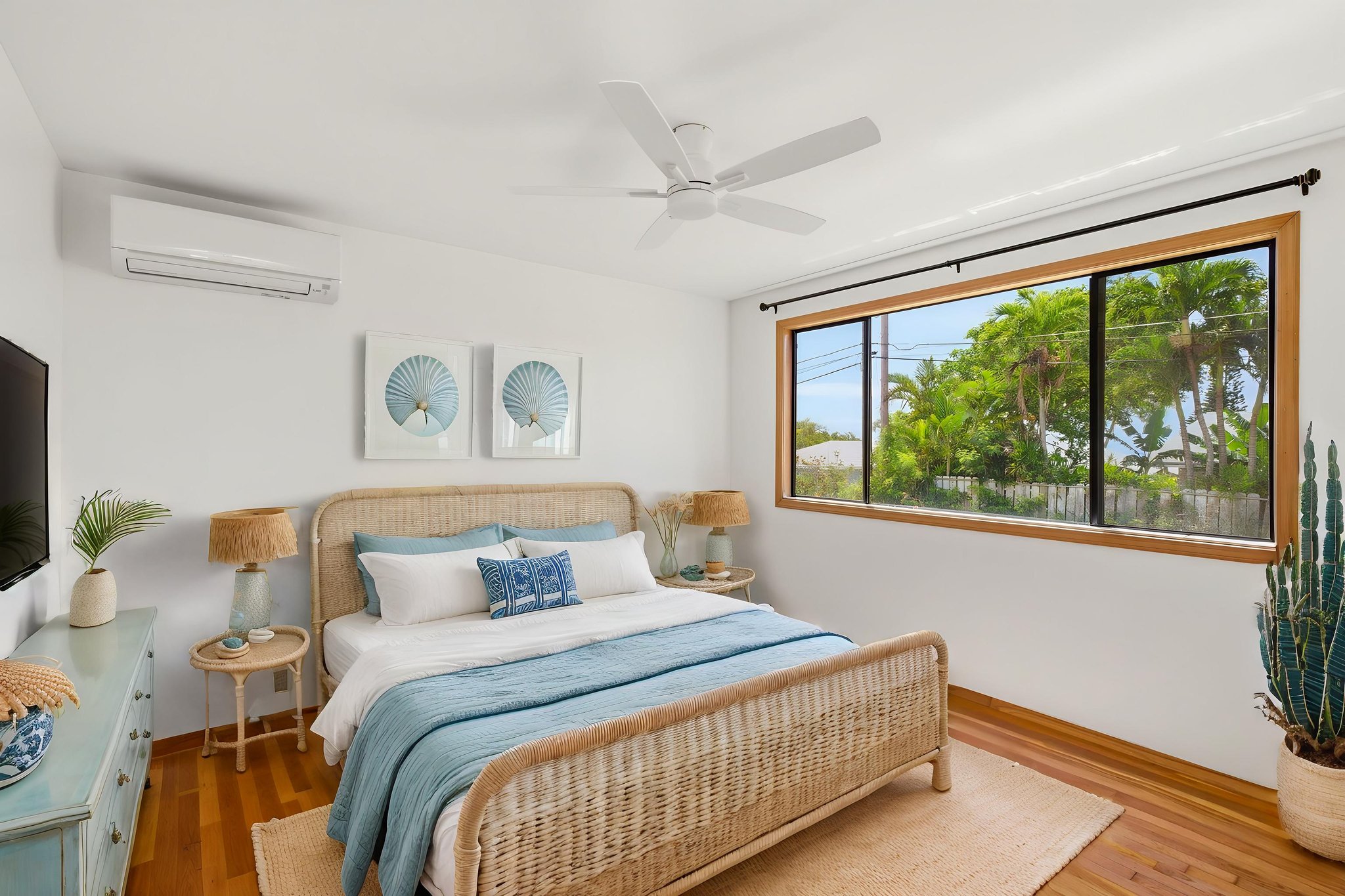 3685 Waha Road Kalaheo, HI 96741 - Photo 22 of 30 a bedroom with a large bed and a large window