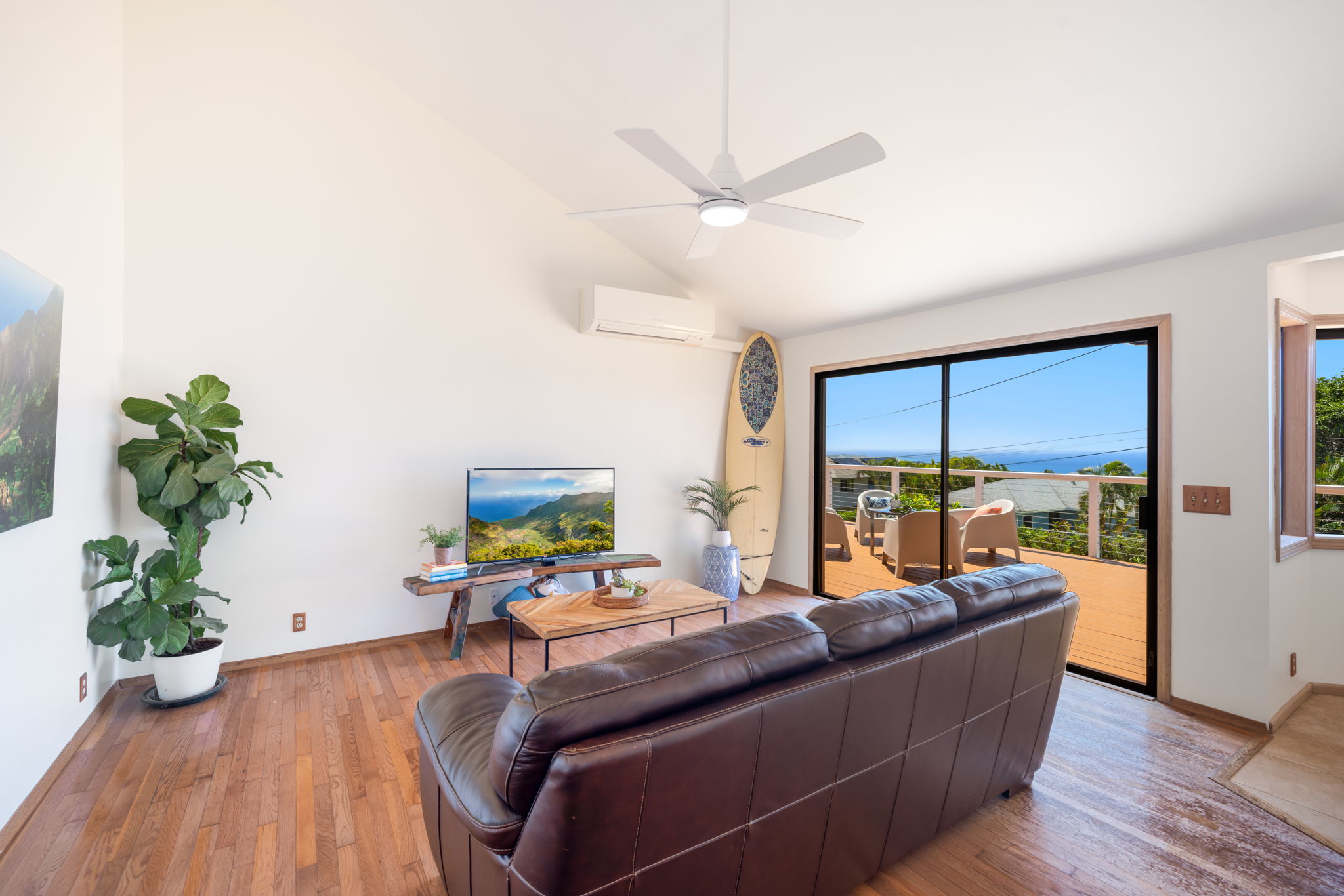 3685 Waha Road Kalaheo, HI 96741 - Photo 6 of 30 a living room with furniture and a potted plant