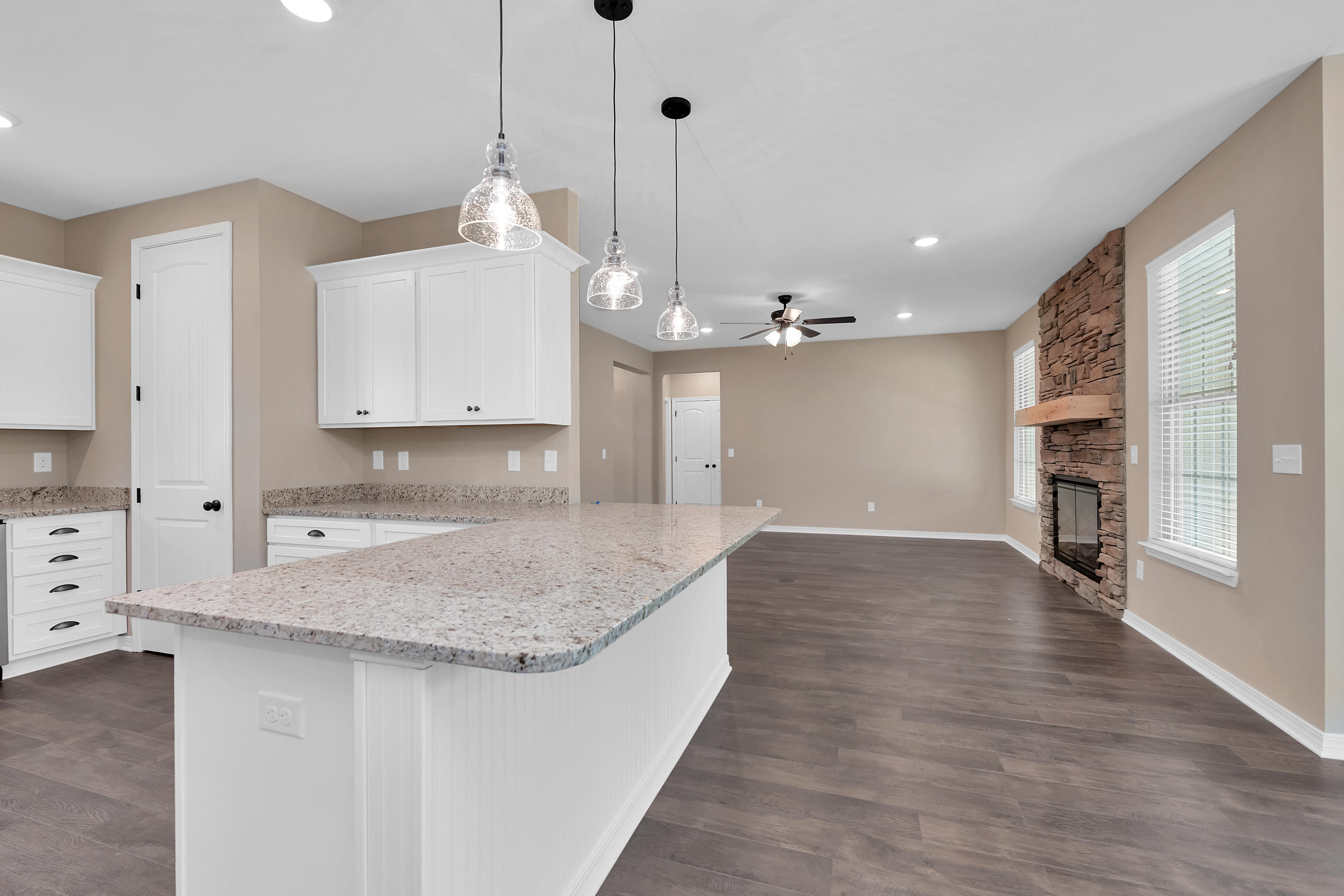 6195 Timberland Ridge Drive Crestview, FL 32539 - Photo 15 of 39 a kitchen with kitchen island a counter top space appliances and cabinets