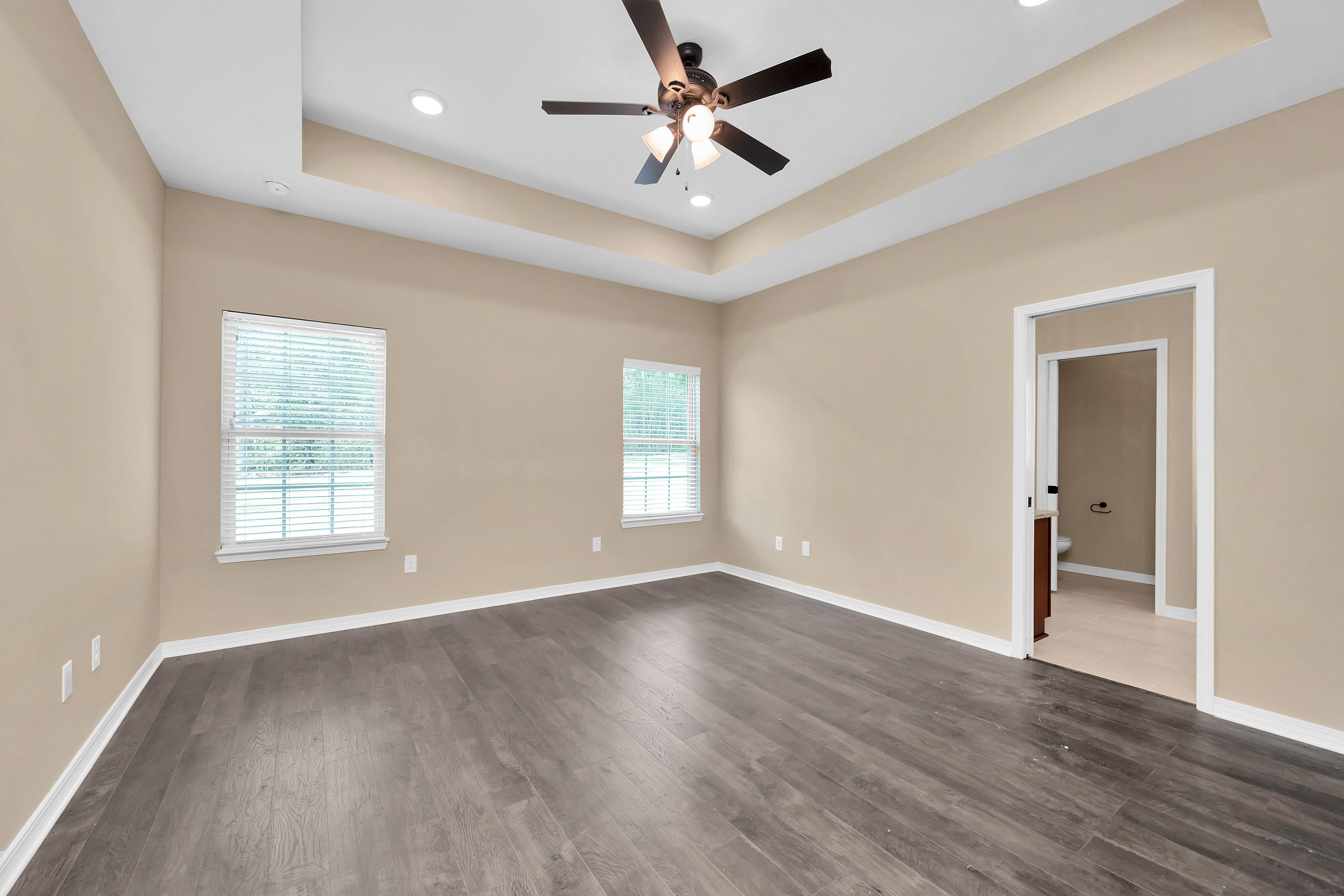 6195 Timberland Ridge Drive Crestview, FL 32539 - Photo 31 of 39 a view of an empty room with window and wooden floor