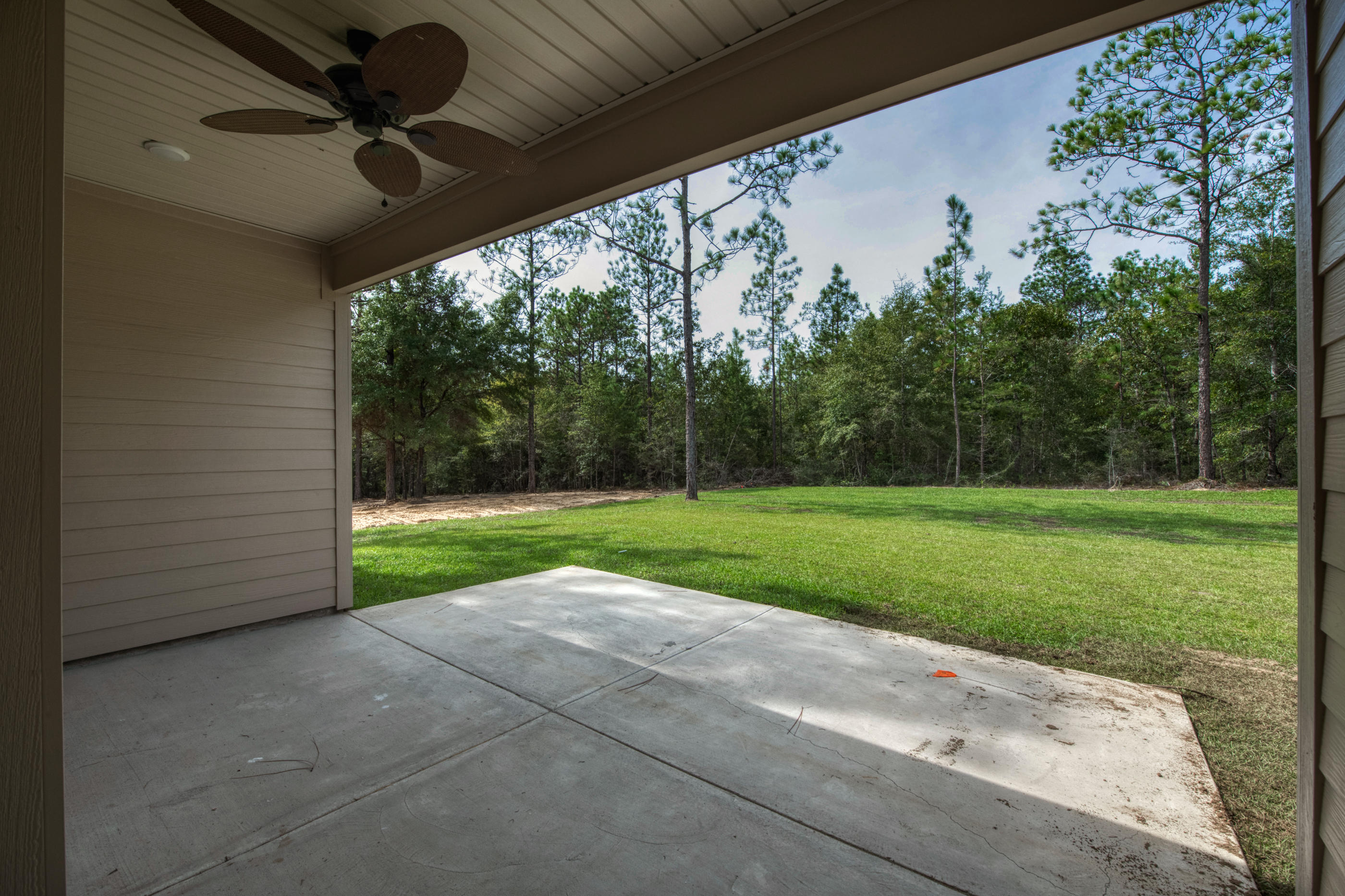 6195 Timberland Ridge Drive Crestview, FL 32539 - Photo 32 of 39 a view of a house with backyard and porch