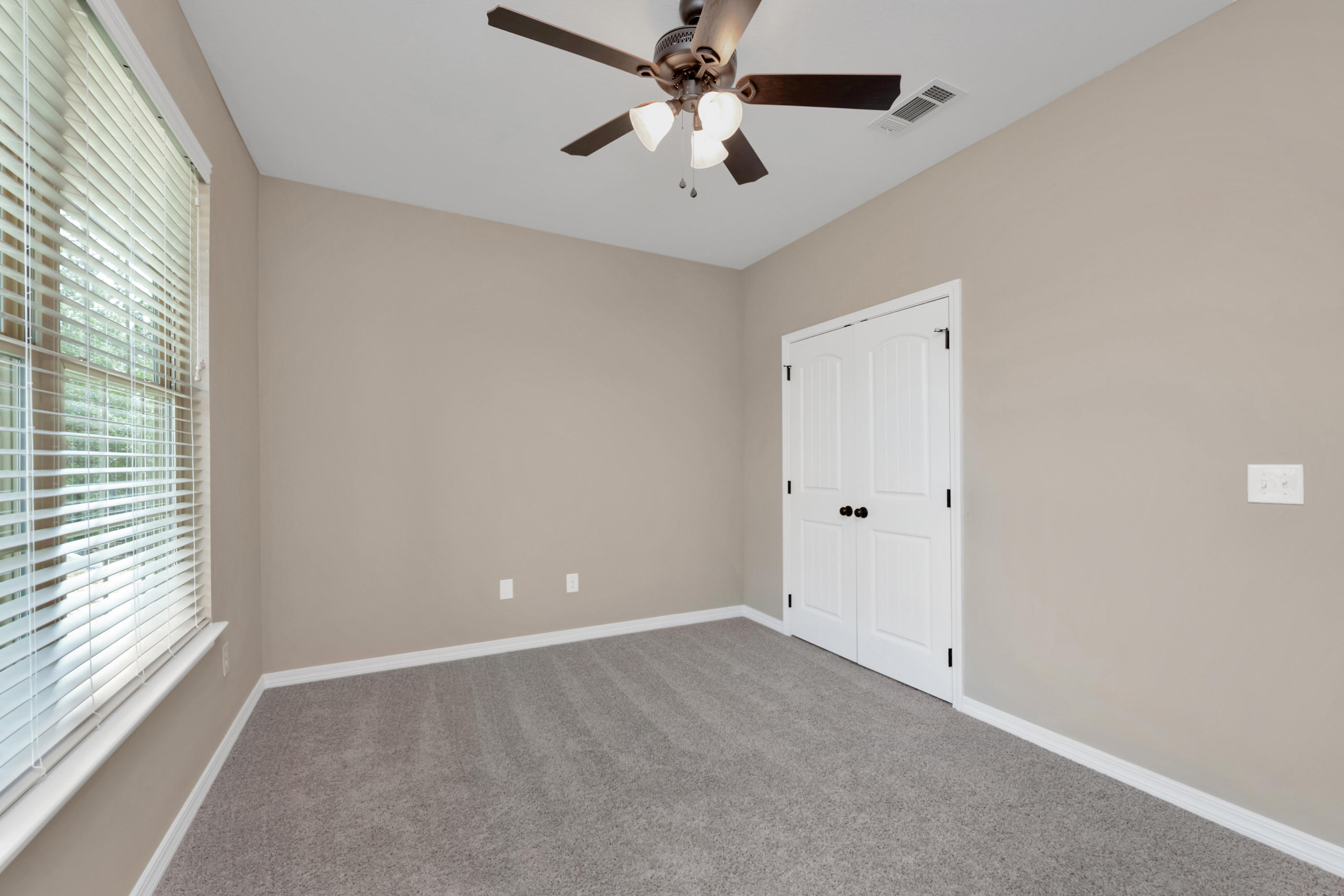 6195 Timberland Ridge Drive Crestview, FL 32539 - Photo 7 of 39 a view of an empty room with a window