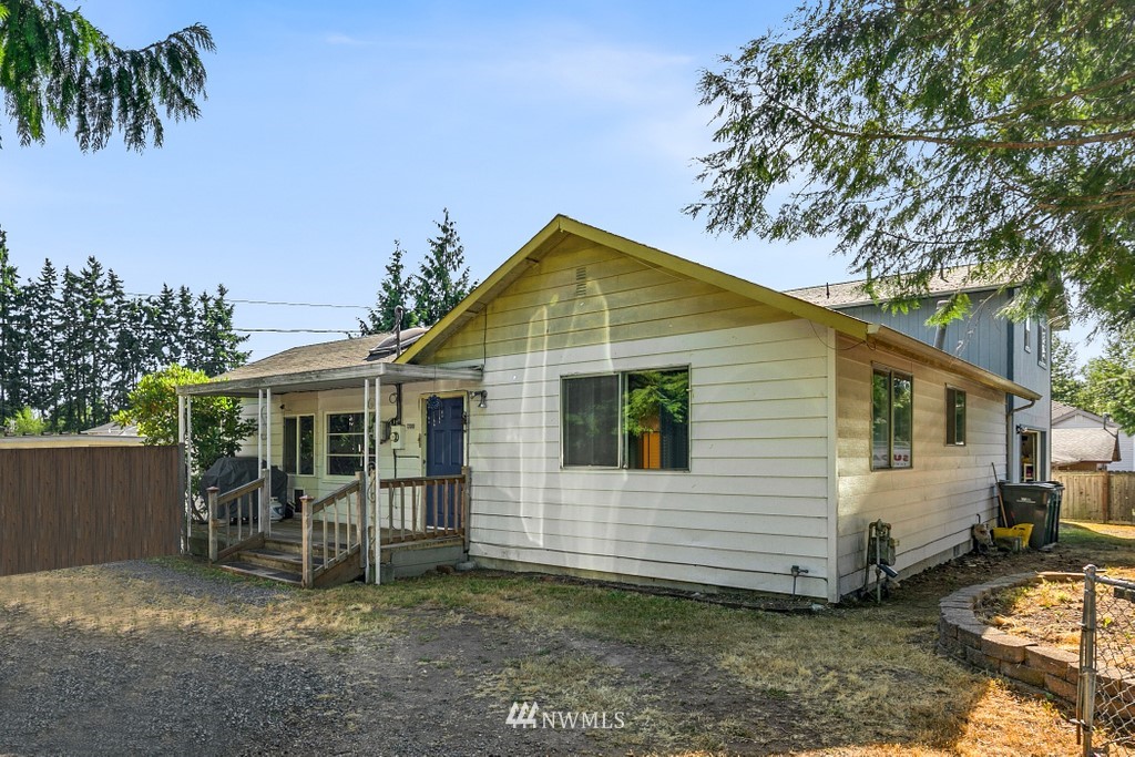 12008 Gibson Road Everett, WA 98204 - Photo 1 of 32 a view of a house with a yard