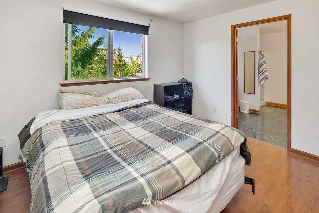12008 Gibson Road Everett, WA 98204 - Photo 23 of 32 a bedroom with a bed and a window