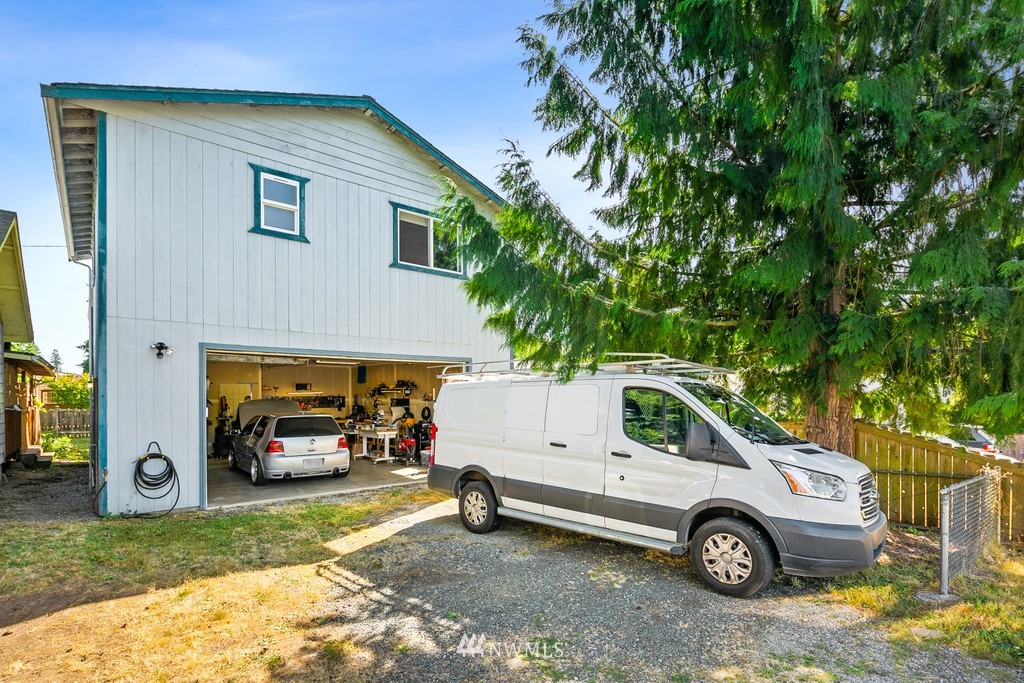 12008 Gibson Road Everett, WA 98204 - Photo 26 of 32 a view of a car in front of a house