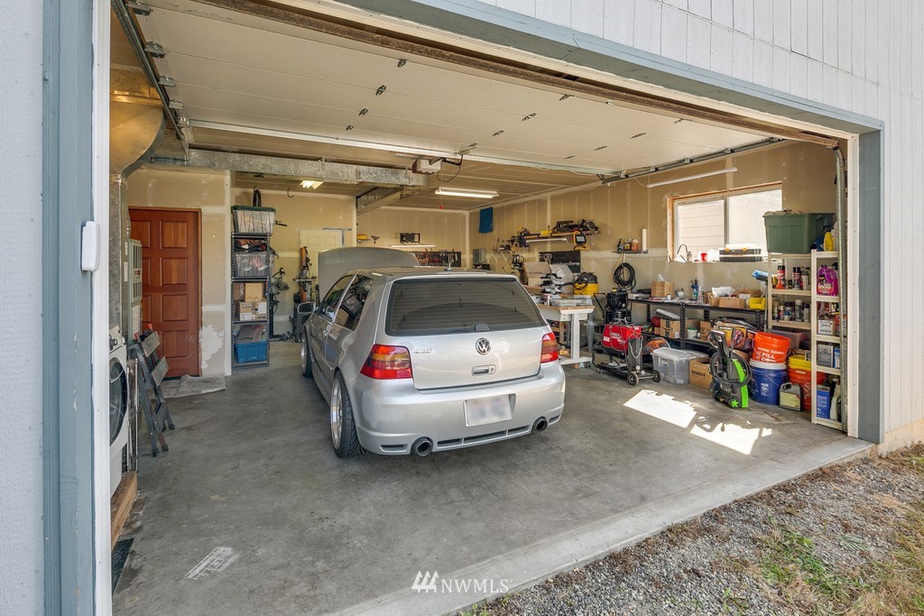 12008 Gibson Road Everett, WA 98204 - Photo 27 of 32 a utility room with lot of items