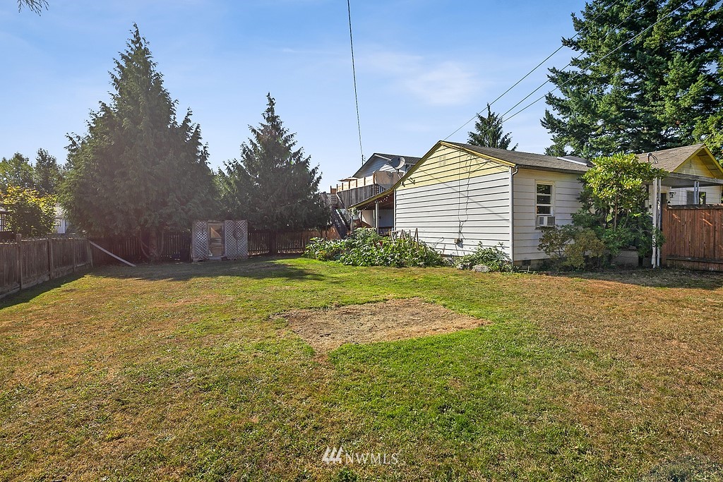 12008 Gibson Road Everett, WA 98204 - Photo 28 of 32 a view of a house with a yard