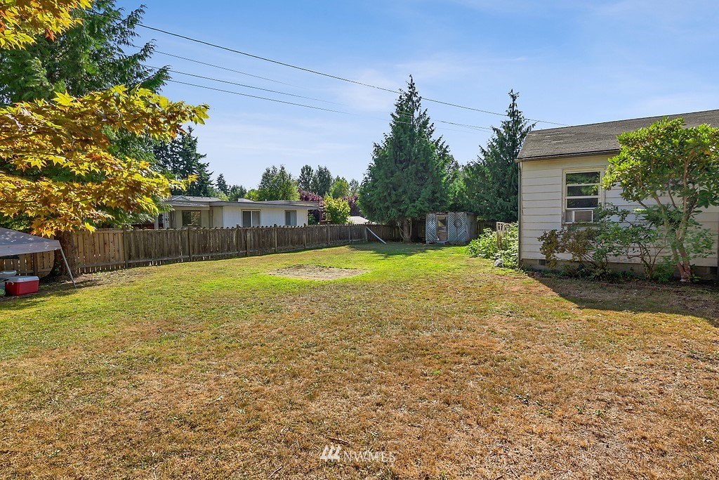12008 Gibson Road Everett, WA 98204 - Photo 29 of 32 a view of a backyard with a small cabin