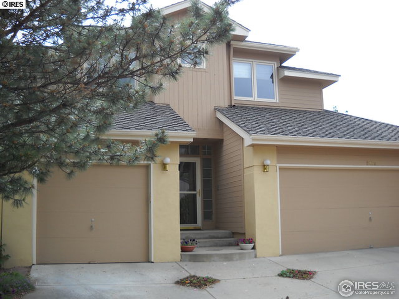 3172 Redstone Road Boulder, CO 80305 - Photo 1 of 24 a front view of a house with a garage