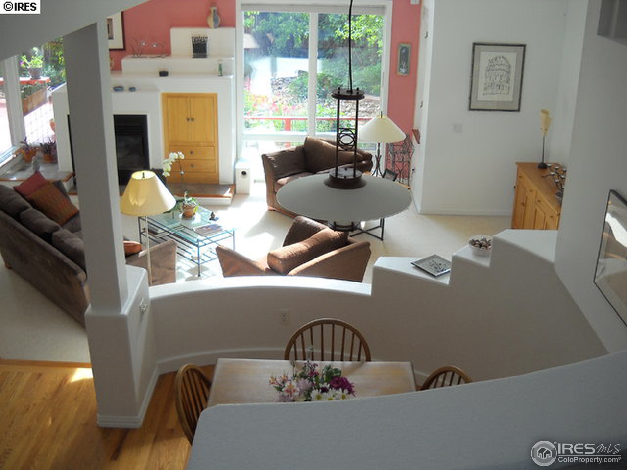 3172 Redstone Road Boulder, CO 80305 - Photo 15 of 24 a living room with furniture and a floor to ceiling window