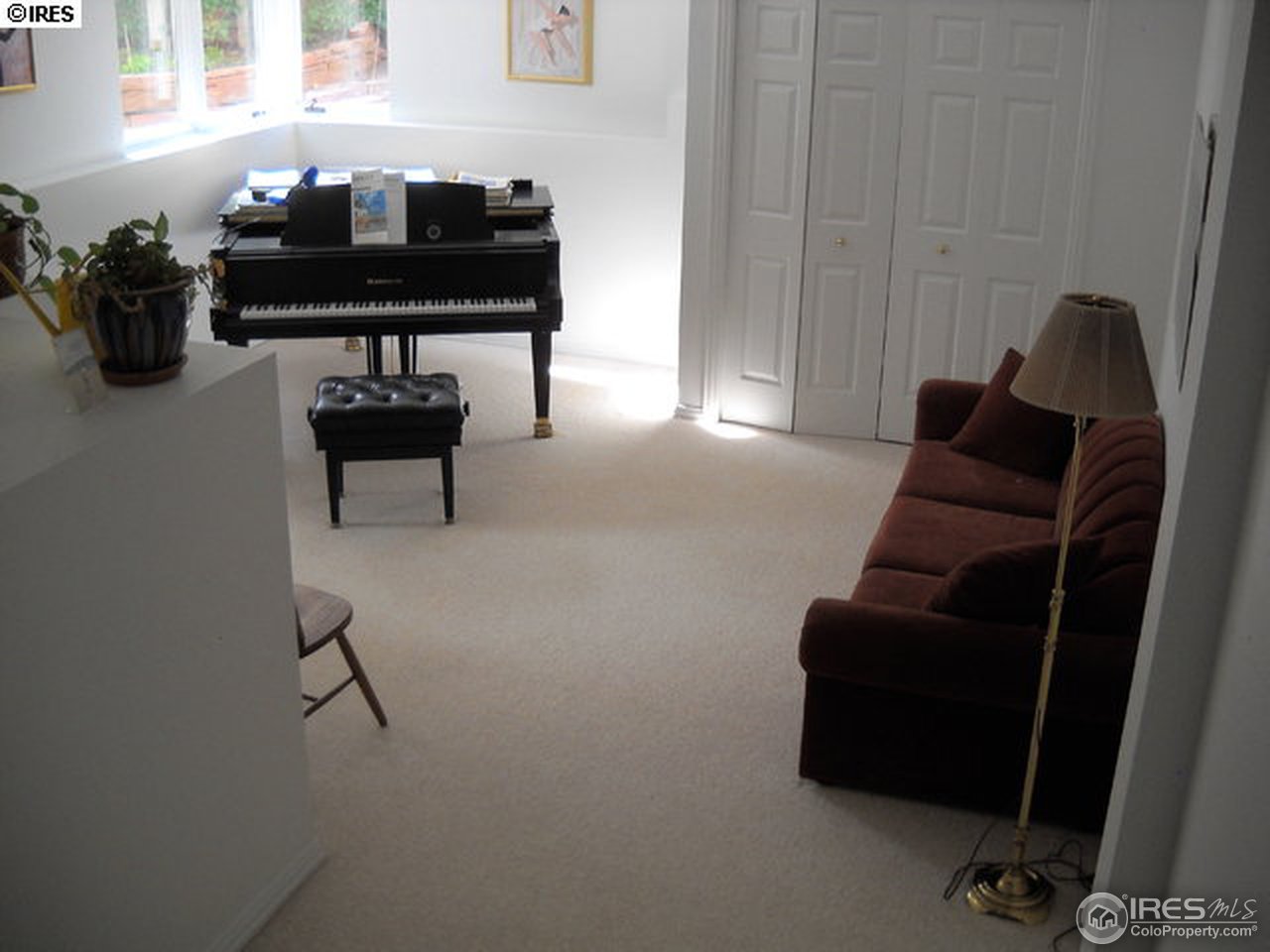 3172 Redstone Road Boulder, CO 80305 - Photo 16 of 24 a living room with furniture and a window