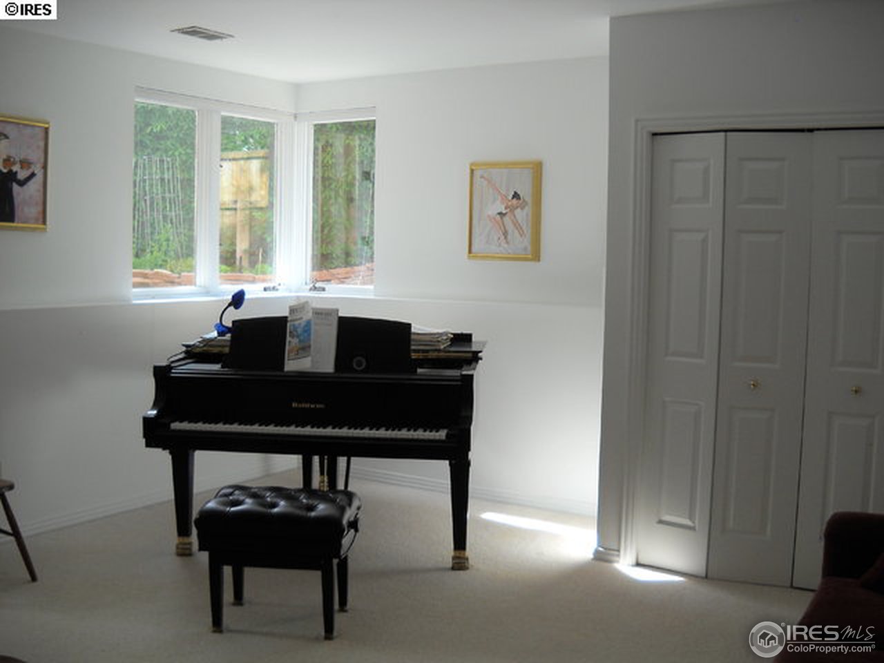 3172 Redstone Road Boulder, CO 80305 - Photo 17 of 24 a table and chair in a room with a window