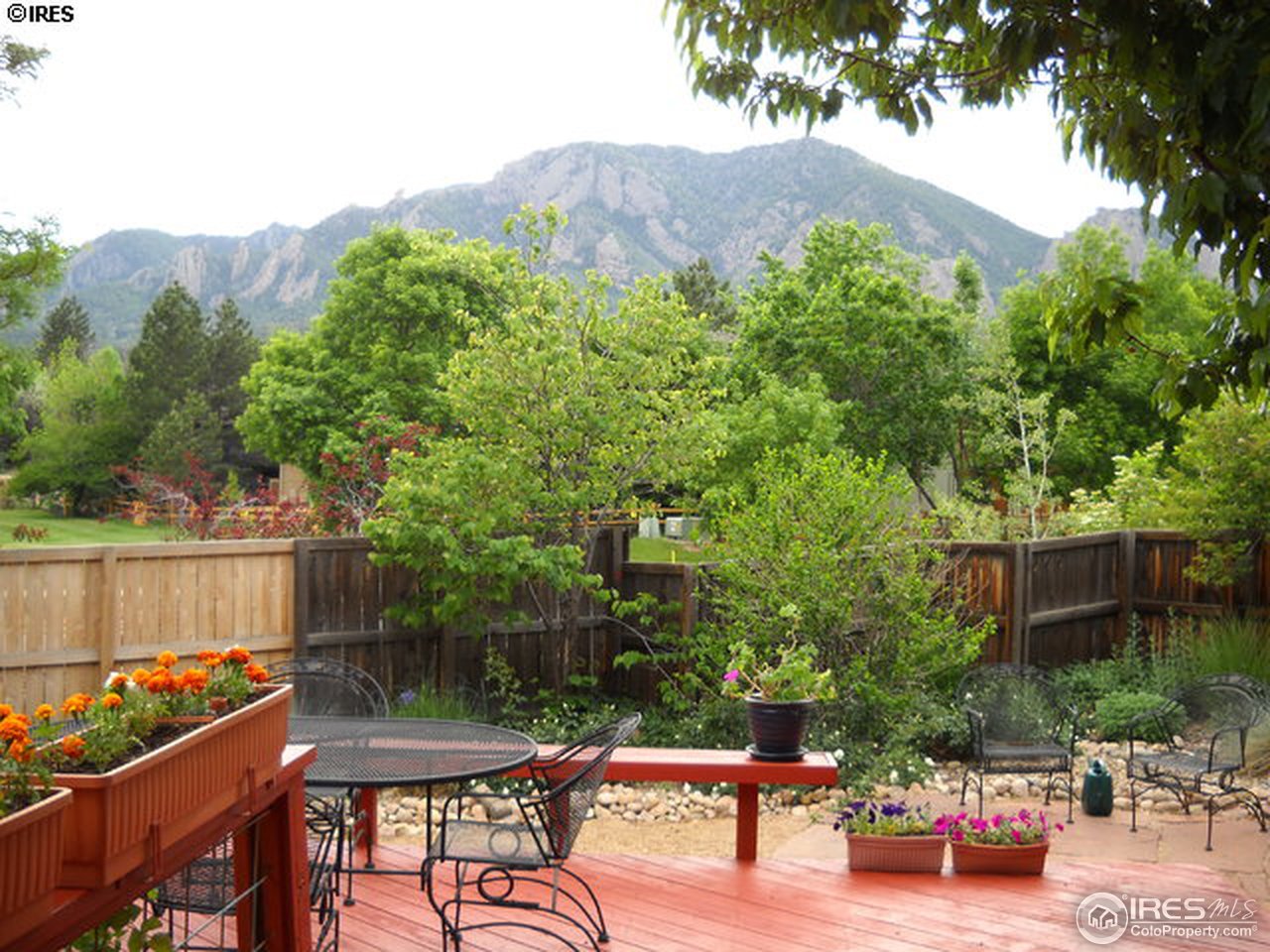 3172 Redstone Road Boulder, CO 80305 - Photo 18 of 24 an outdoor sitting area with furniture and garden