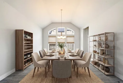 a dining room with furniture and window