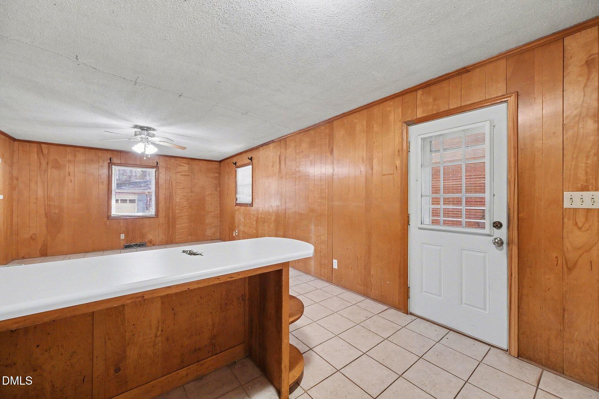 3312 Hamlin Road Durham, NC 27704 - Photo 12 of 37 a room with a table and chairs