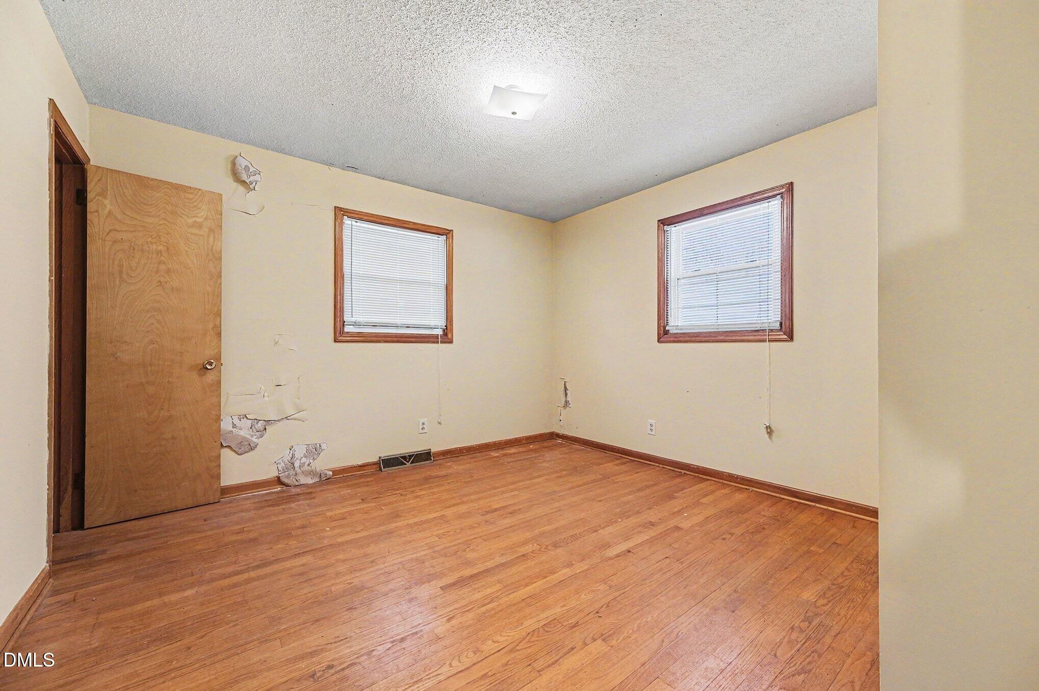 3312 Hamlin Road Durham, NC 27704 - Photo 15 of 37 wooden floor in an empty room