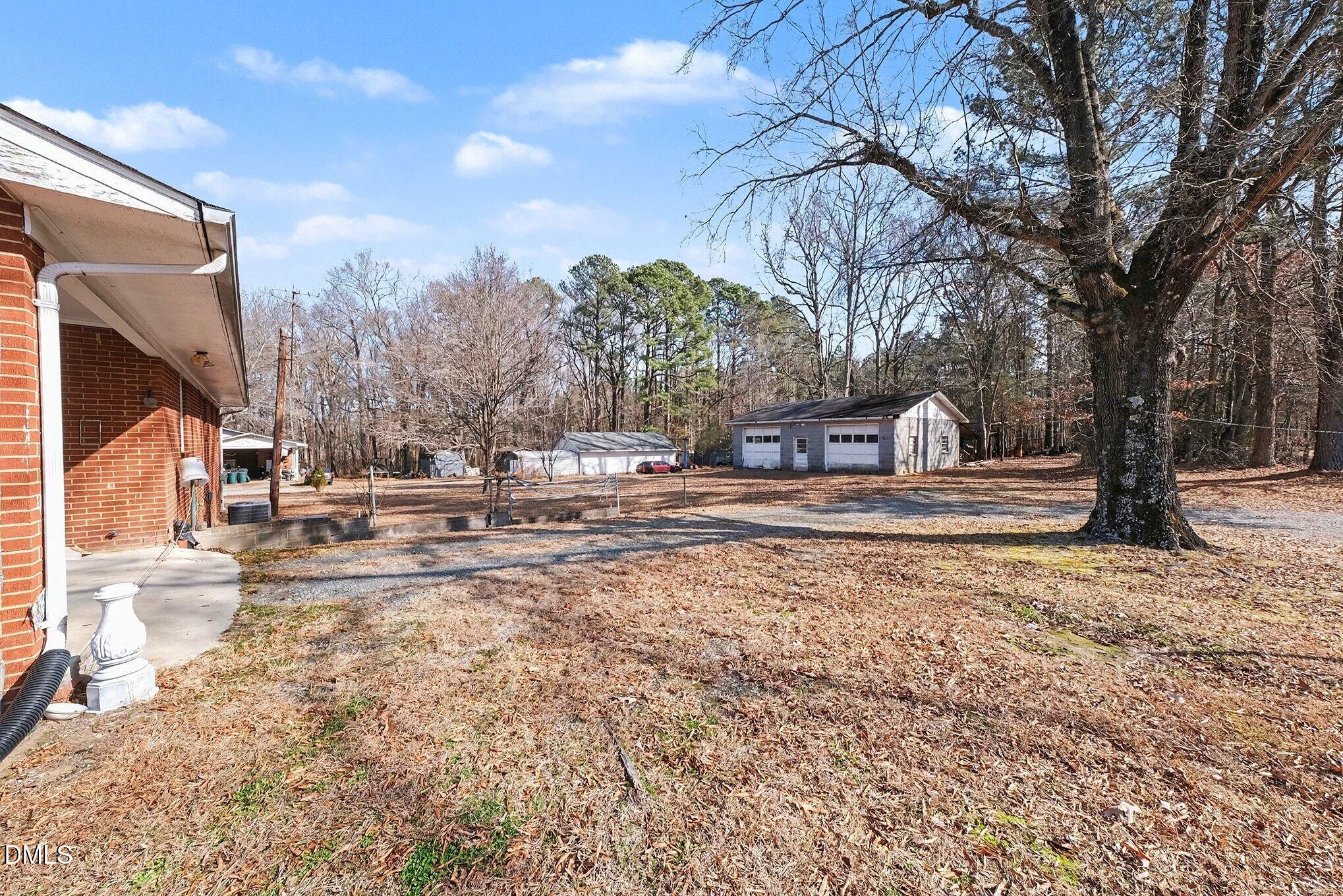 3312 Hamlin Road Durham, NC 27704 - Photo 22 of 37 a view of outdoor space with trees