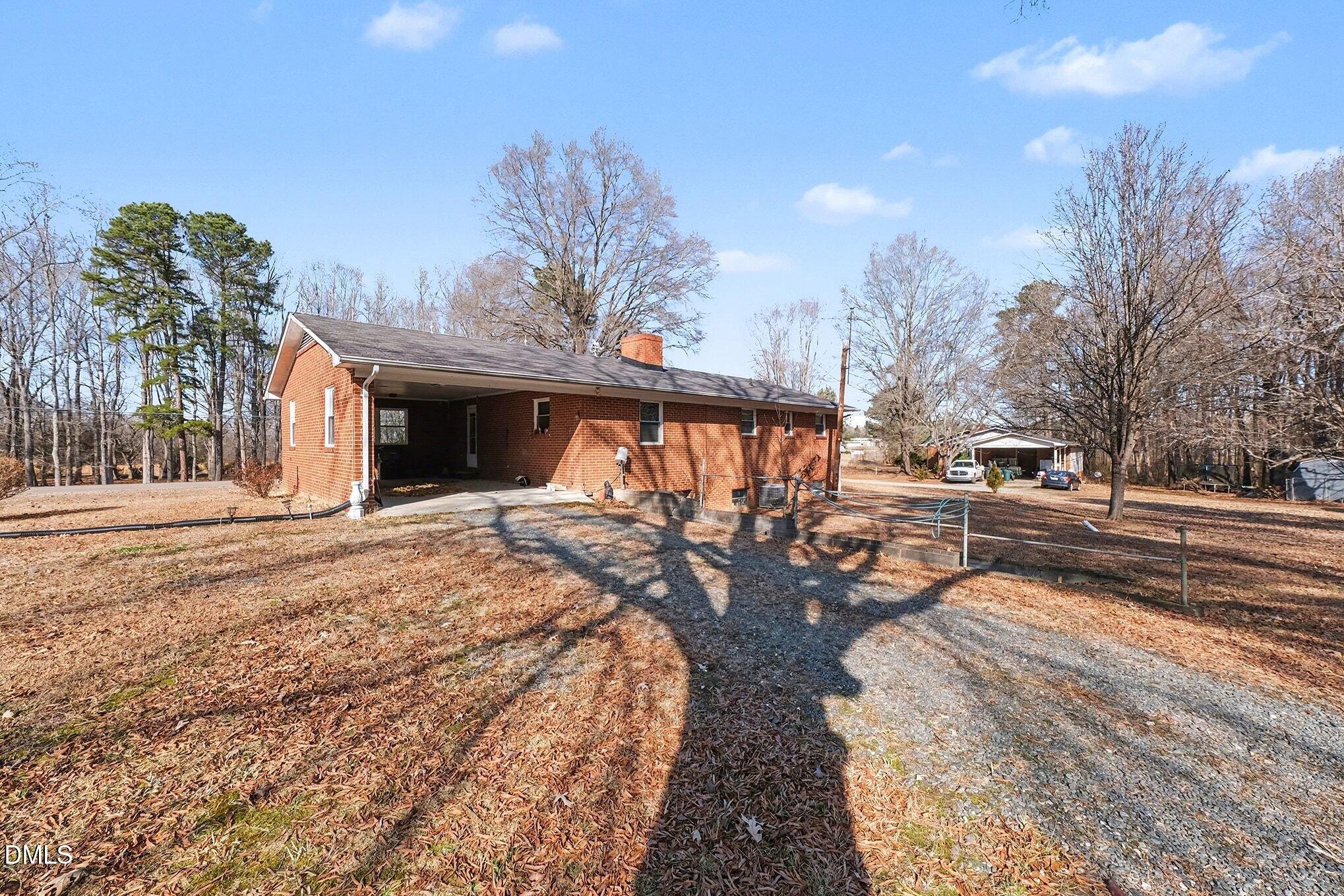 3312 Hamlin Road Durham, NC 27704 - Photo 23 of 37 a view of a house with a yard