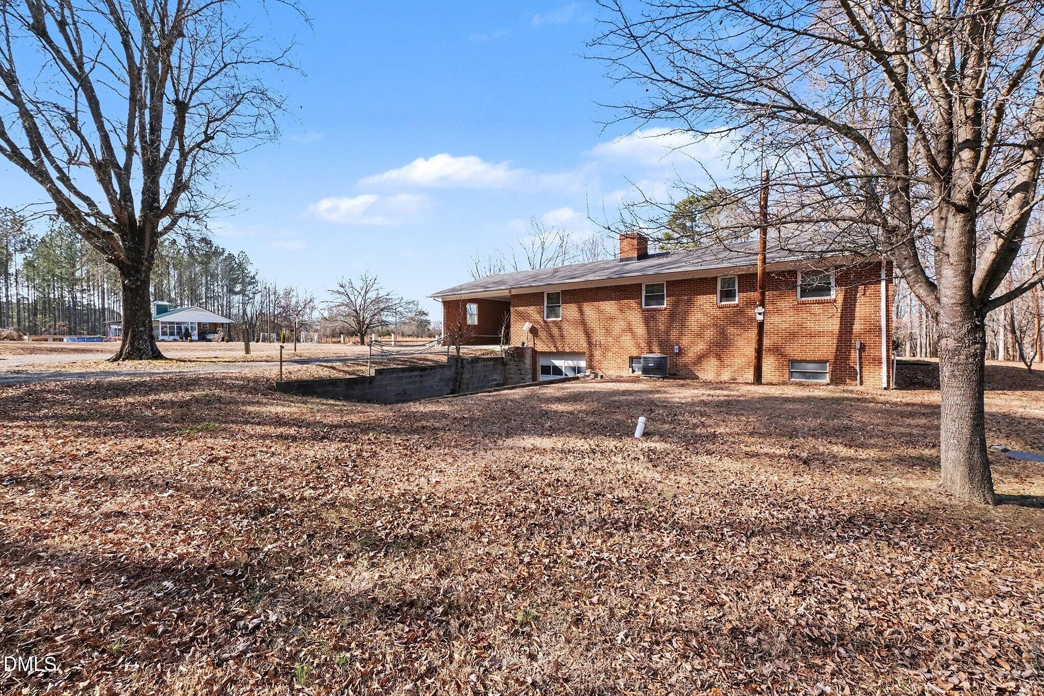 3312 Hamlin Road Durham, NC 27704 - Photo 24 of 37 a view of yard with tree s