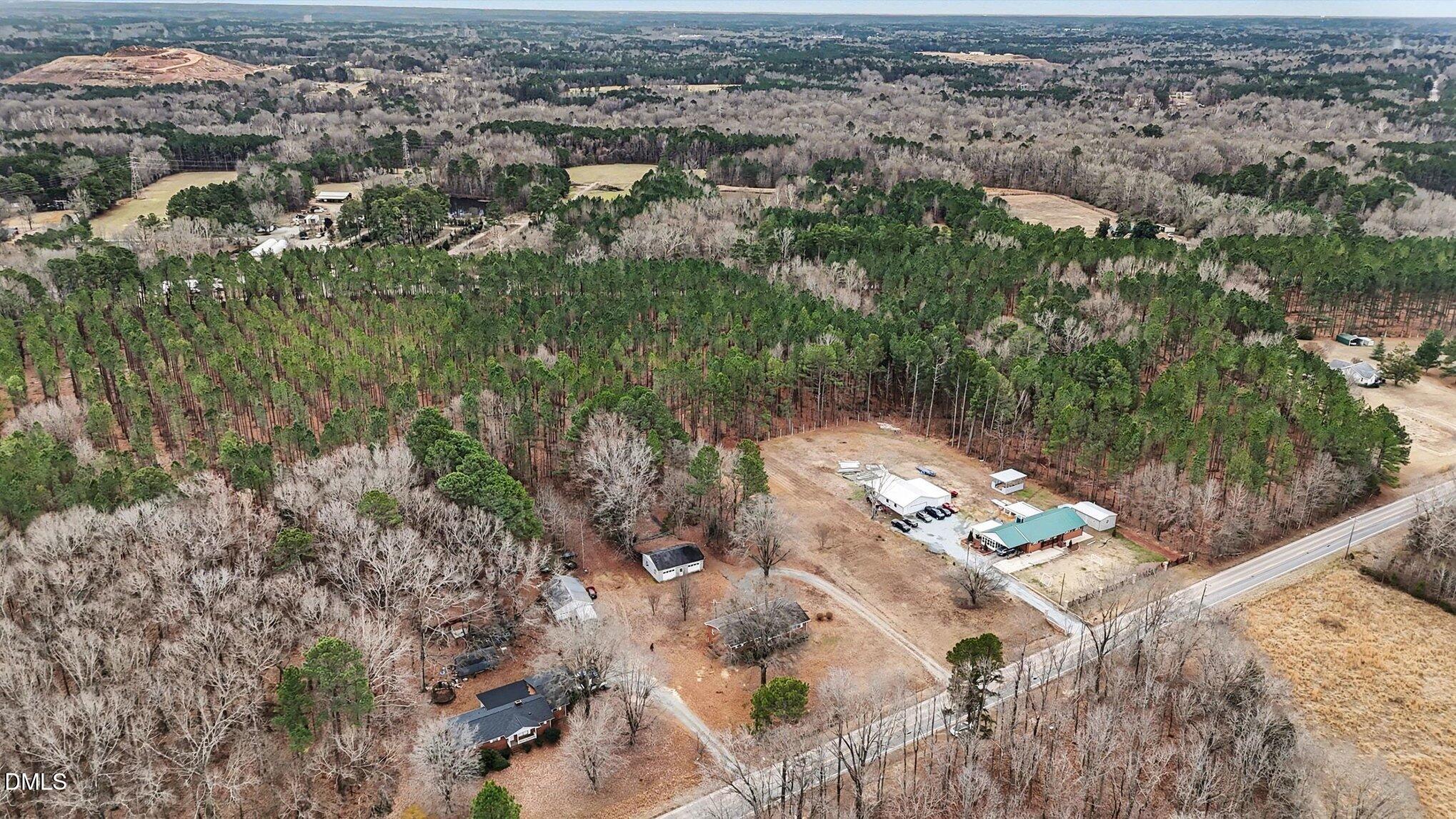 3312 Hamlin Road Durham, NC 27704 - Photo 25 of 37 an aerial view of a house with a yard