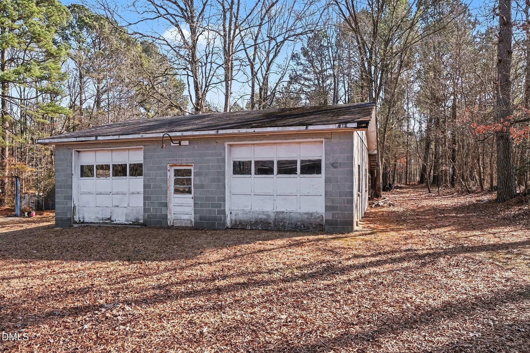 3312 Hamlin Road Durham, NC 27704 - Photo 27 of 37 a front view of a house with a yard