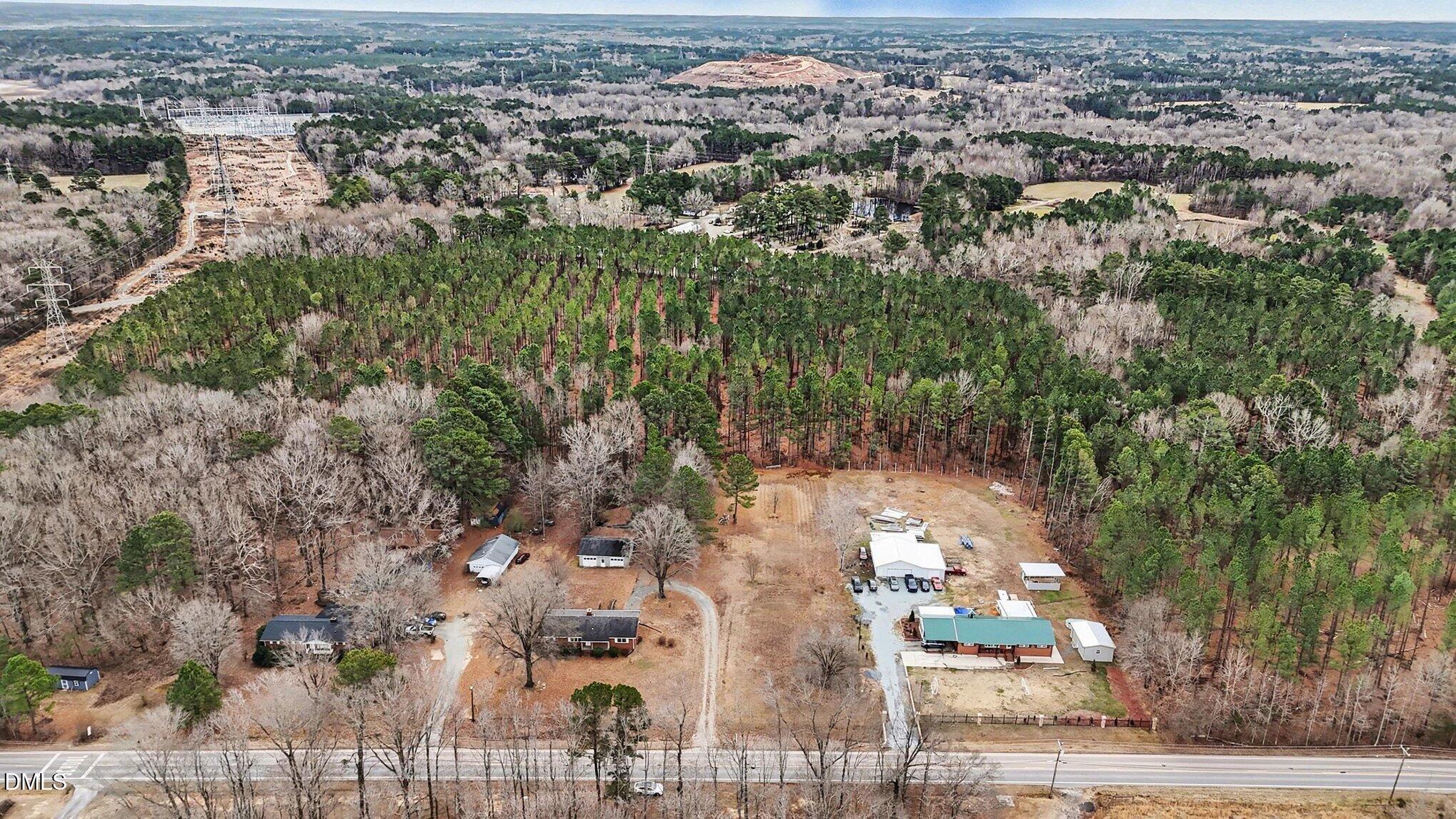 3312 Hamlin Road Durham, NC 27704 - Photo 29 of 37 an aerial view of residential houses with outdoor space