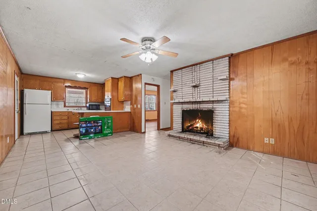 a view of snow on the side of a road