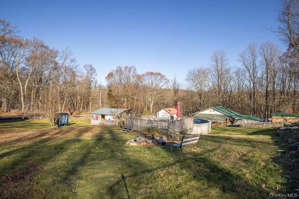 355 Fosler Road Wallkill, NY 12589 - Photo 28 of 33 View of green lawn featuring an outdoor pool
