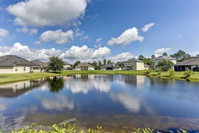 a view of a lake with houses