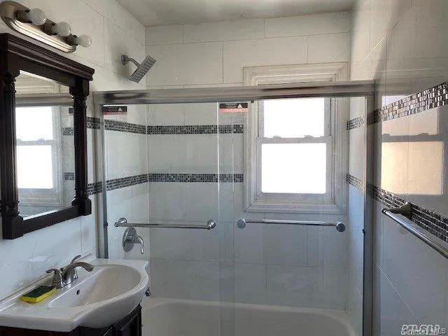 a bathroom with a sink and a bathtub