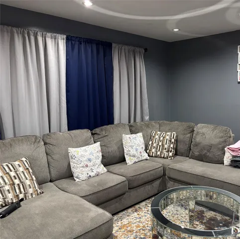 a kitchen with granite countertop a stove and a refrigerator