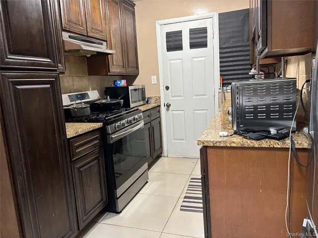 a view of outdoor space and front door of house
