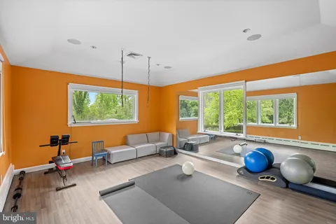 a room with furniture and a large window
