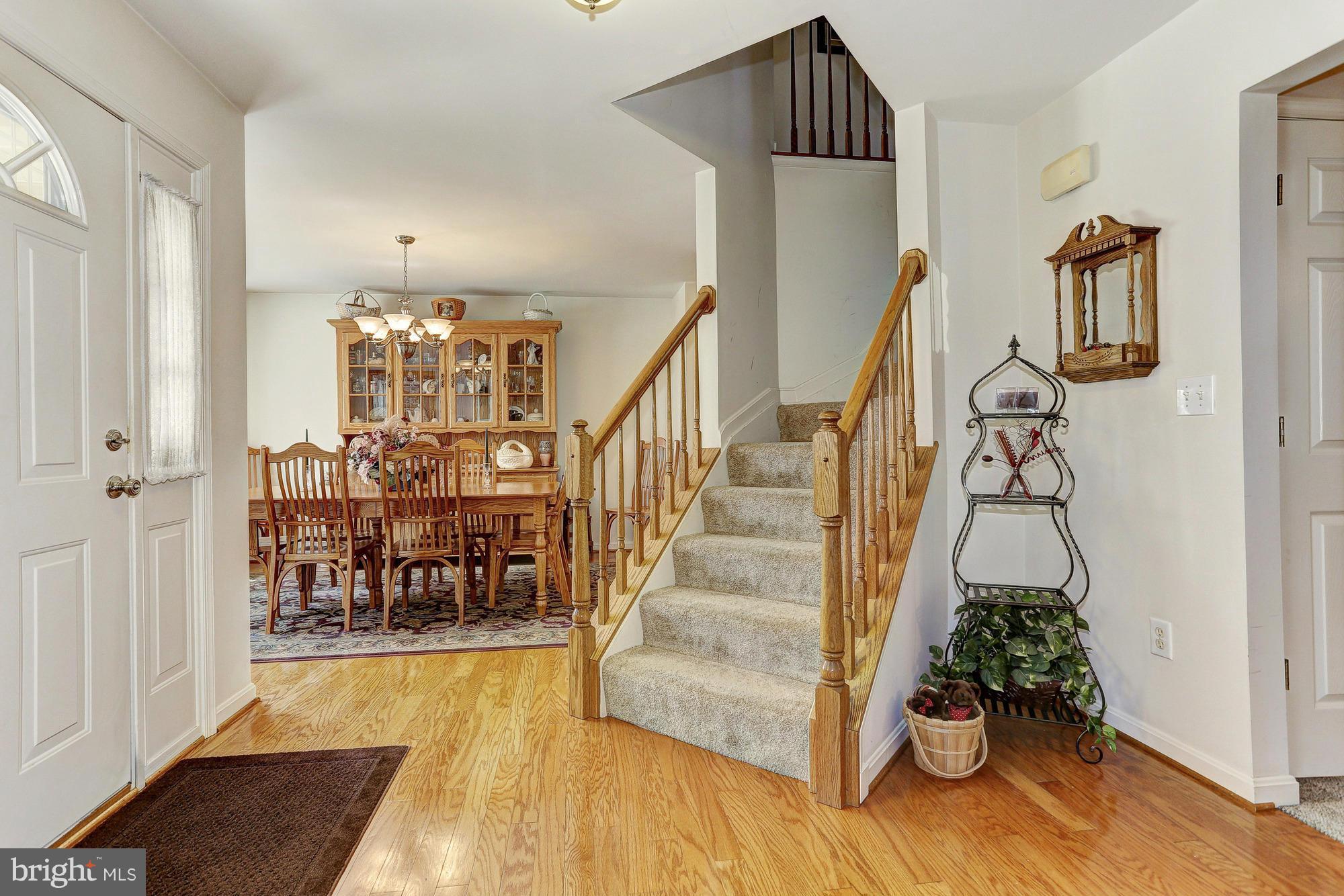 506 Ridge Road Finksburg, MD 21048 - Photo 2 of 30 a view of entryway livingroom and hall with wooden floor
