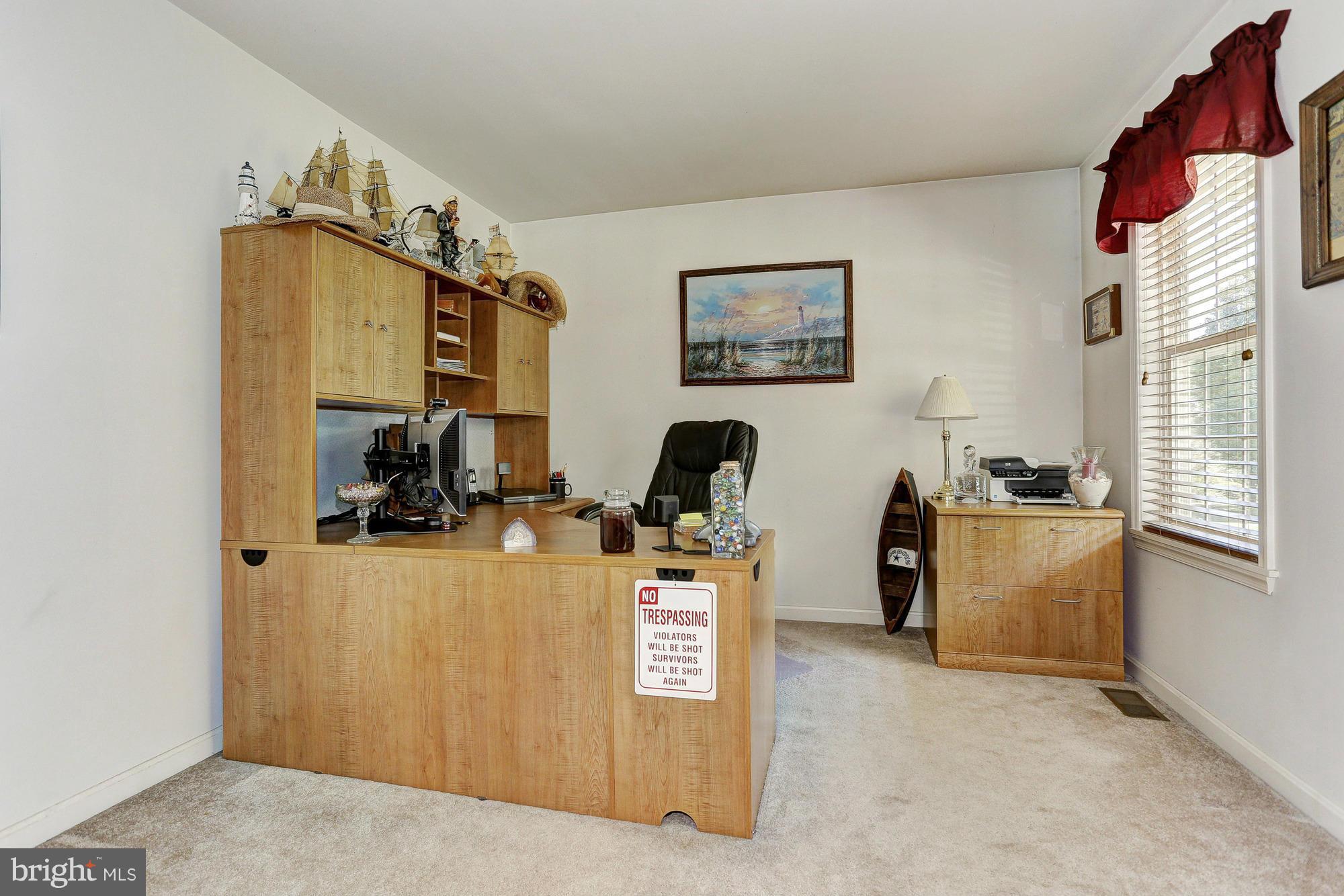 506 Ridge Road Finksburg, MD 21048 - Photo 12 of 30 a view of a workspace with furniture and a window