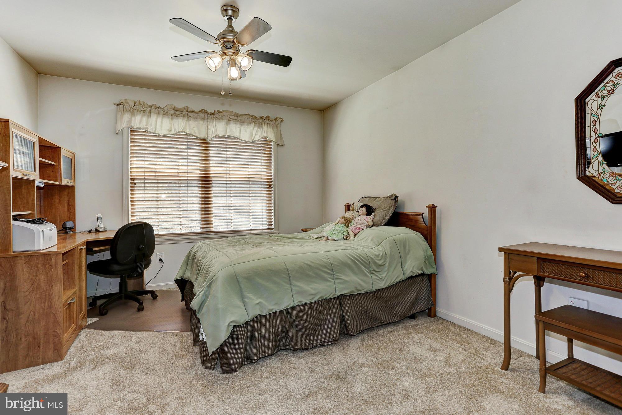 506 Ridge Road Finksburg, MD 21048 - Photo 17 of 30 a bed room with a bed and a window