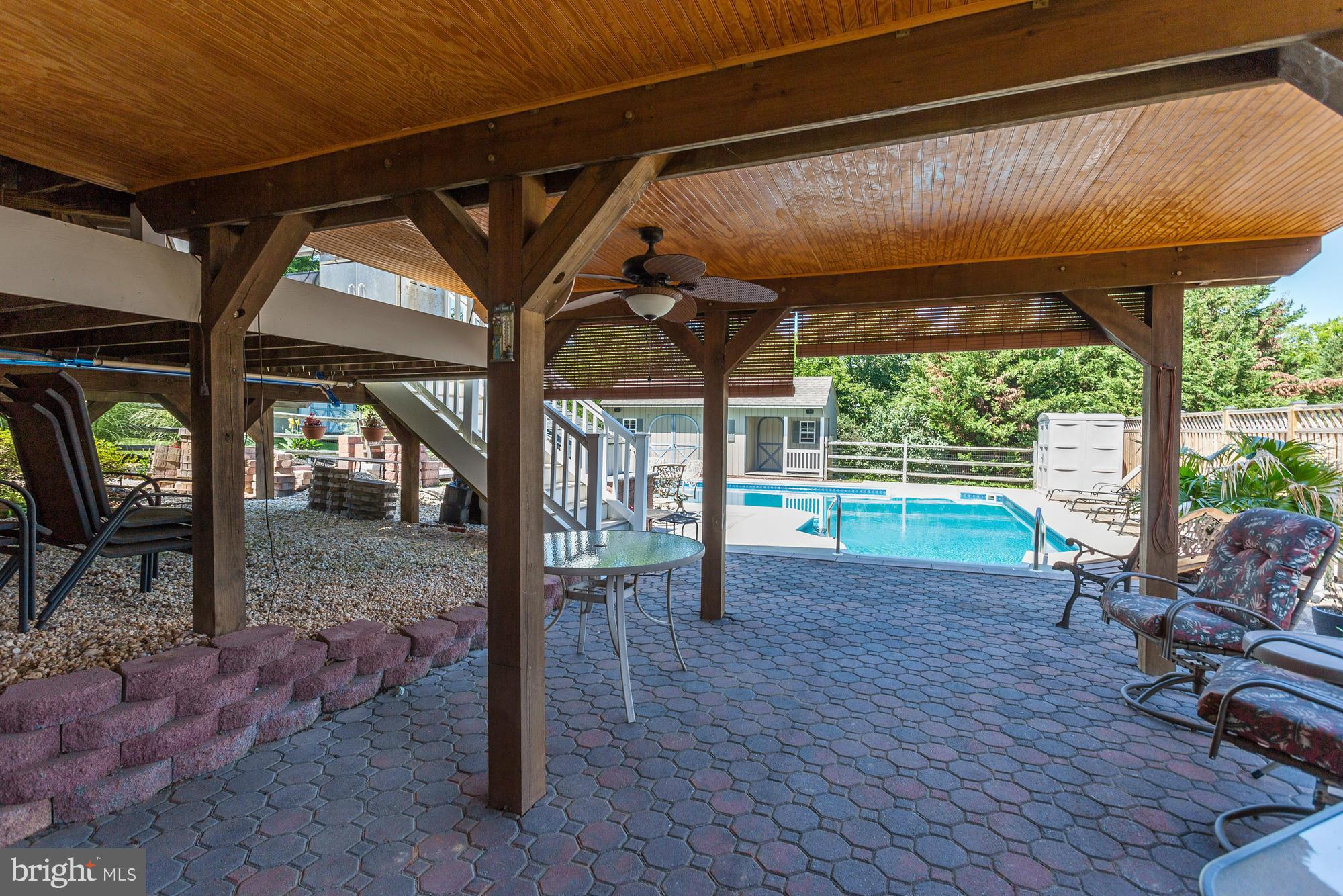506 Ridge Road Finksburg, MD 21048 - Photo 22 of 30 a view of a porch with furniture and a backyard