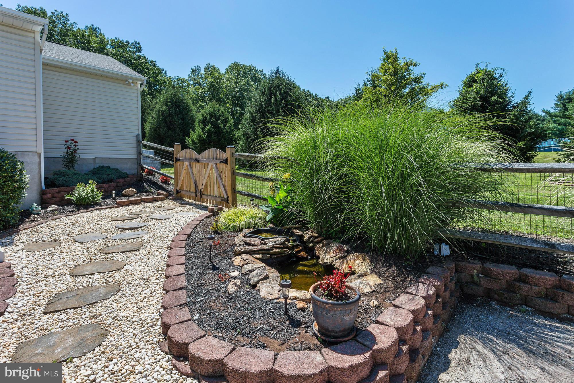 506 Ridge Road Finksburg, MD 21048 - Photo 27 of 30 a backyard of a house with lots of green space