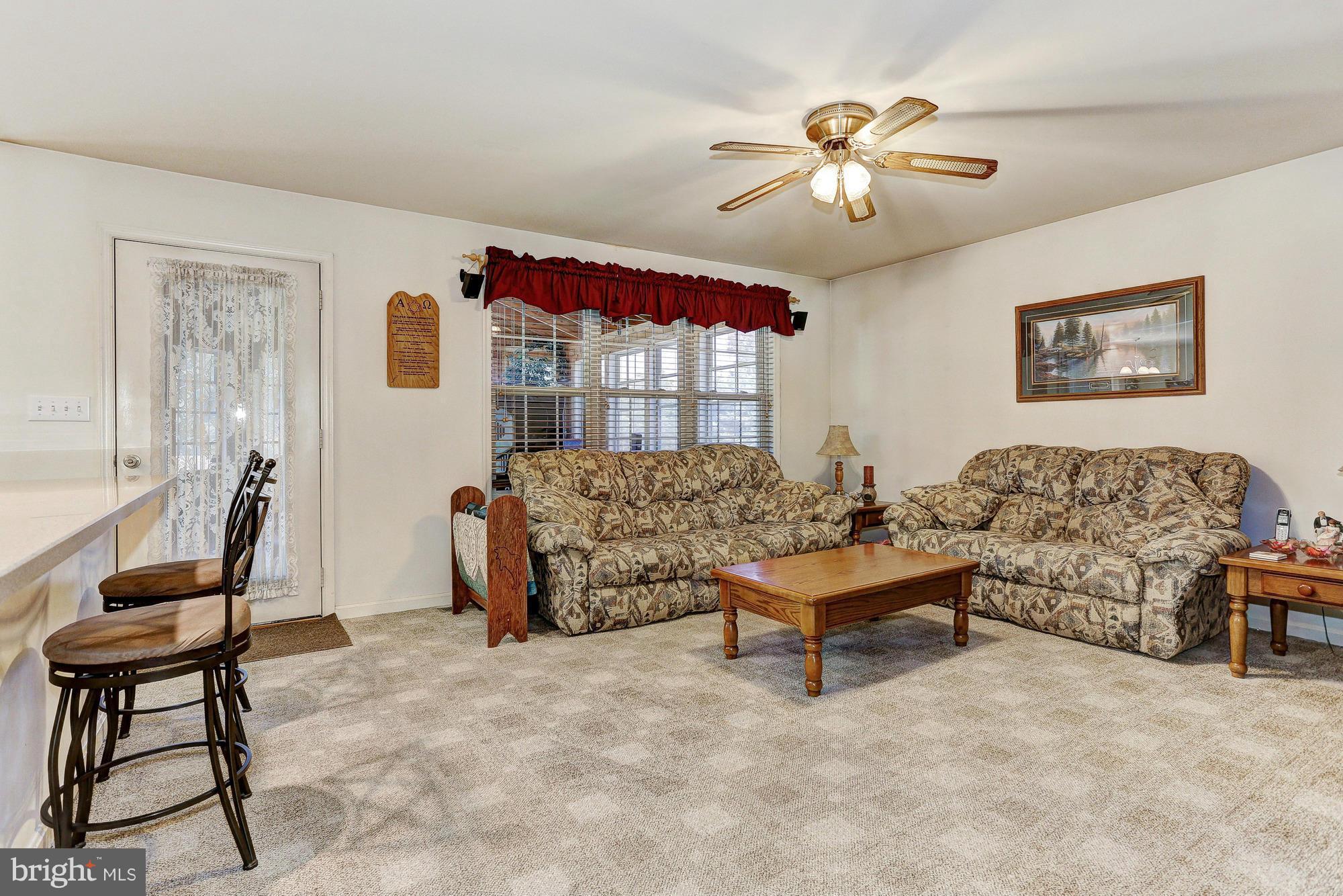 506 Ridge Road Finksburg, MD 21048 - Photo 5 of 30 a living room with furniture and white walls
